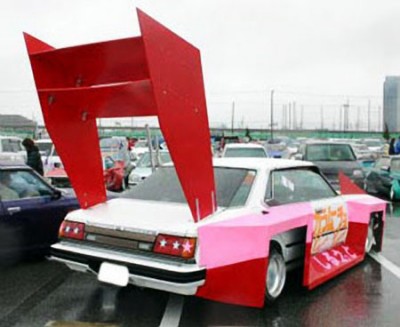 pimped-red-car-huge-spoiler_original.jpg